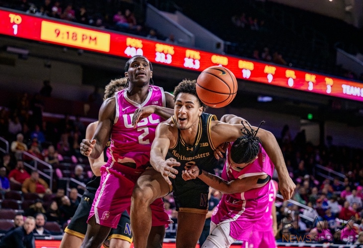 Northwestern Defeats USC 74-68