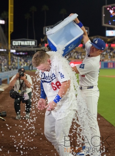 Dodgers defeat Rockies, 8-7